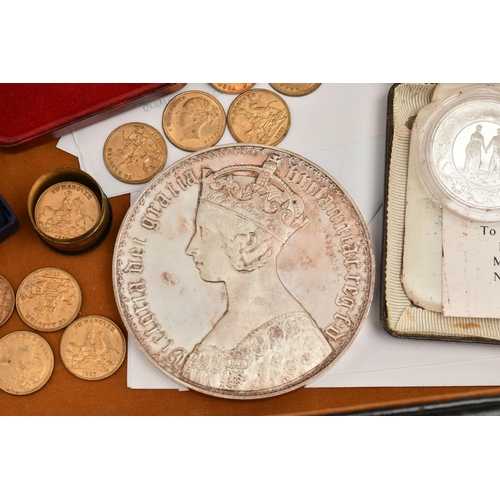 135 - A COMBINATION BRIEFCASE CONTAINING AMOUNTS OF COIN MEDALS and COMMEMORATIVES, to include a proof Mau... 