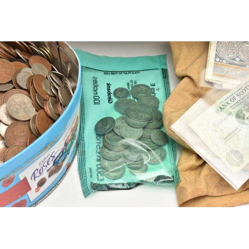 168 - A ROSES TIN OF MIXED COINS, to include 200 grams of Pre 1947 Silver coins, banknotes etc