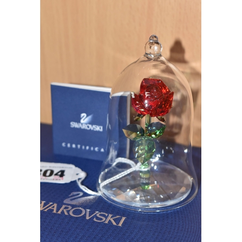 304 - A SWAROVSKI CRYSTAL 'ENCHANTED ROSE' from Disney's 'Beauty and the Beast,' with glass dome, numbered... 