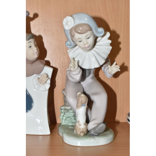 307 - A GROUP OF EIGHT NAO FIGURINES AND ONE LLADRO FIGURE to include a Lladro figure No. 5928 'Jazz Clari... 