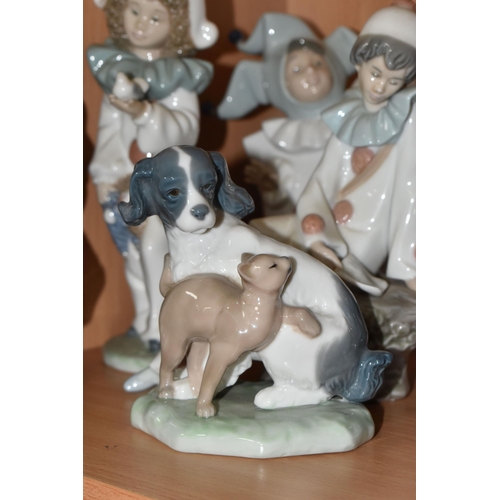 307 - A GROUP OF EIGHT NAO FIGURINES AND ONE LLADRO FIGURE to include a Lladro figure No. 5928 'Jazz Clari... 