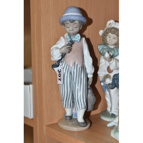 307 - A GROUP OF EIGHT NAO FIGURINES AND ONE LLADRO FIGURE to include a Lladro figure No. 5928 'Jazz Clari... 