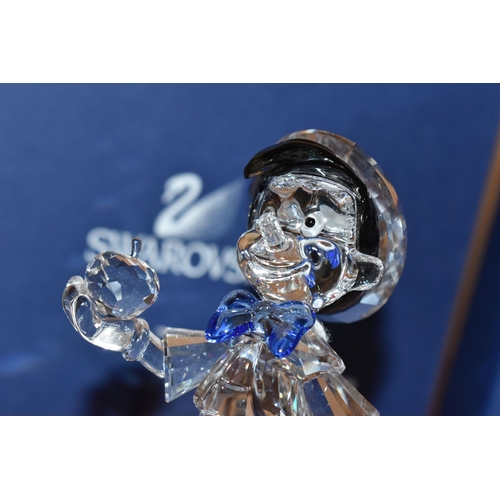 314 - A BOXED SWAROVSKI CRYSTAL'PINOCCHIO' FIGURE, Walt Disney's 'Pinocchio' produced 2010, model no. 1016... 