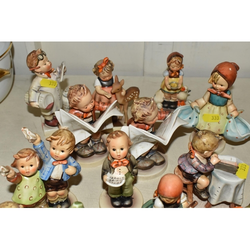 333 - A GROUP OF SIXTEEN HUMMEL FIGURES BY W. GOEBEL to include 'Wayside Harmony' 111 3/0 (marks on the ba... 