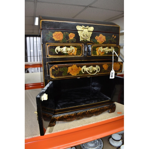 338 - A MODERN ORIENTAL STYLE CABINET, decorated with  transfer print peach coloured roses, a gilt metal b... 