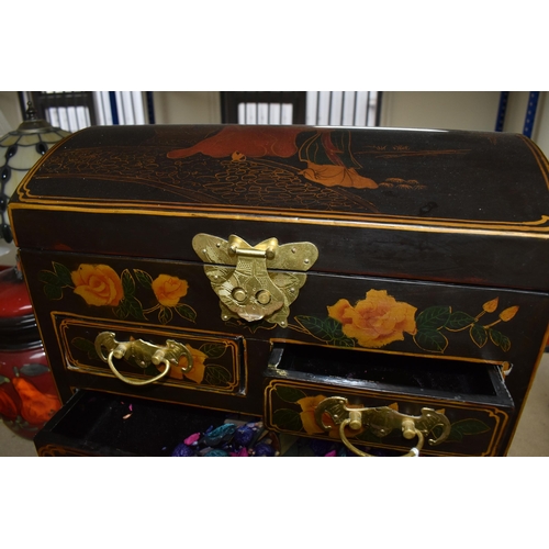 338 - A MODERN ORIENTAL STYLE CABINET, decorated with  transfer print peach coloured roses, a gilt metal b... 