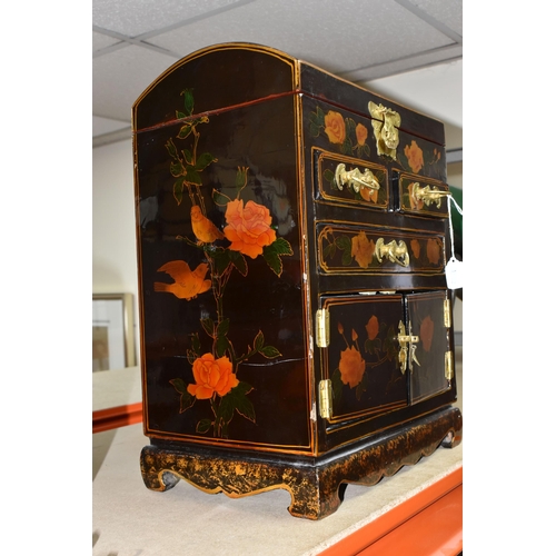 338 - A MODERN ORIENTAL STYLE CABINET, decorated with  transfer print peach coloured roses, a gilt metal b... 