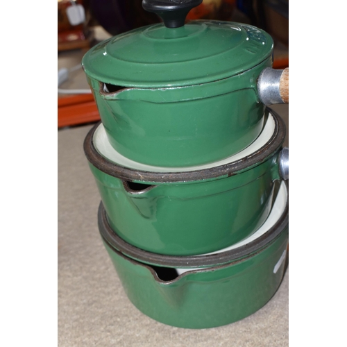 360 - THREE CHASSEUR 'INVICTA' CAST IRON SAUCEPANS, with lids, pouring lips, wooden handles, green enamel ... 