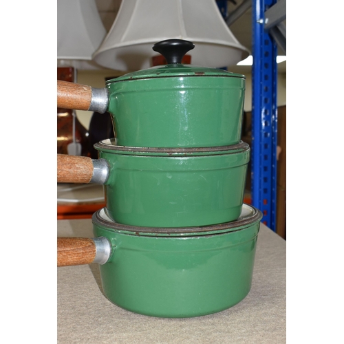 360 - THREE CHASSEUR 'INVICTA' CAST IRON SAUCEPANS, with lids, pouring lips, wooden handles, green enamel ... 