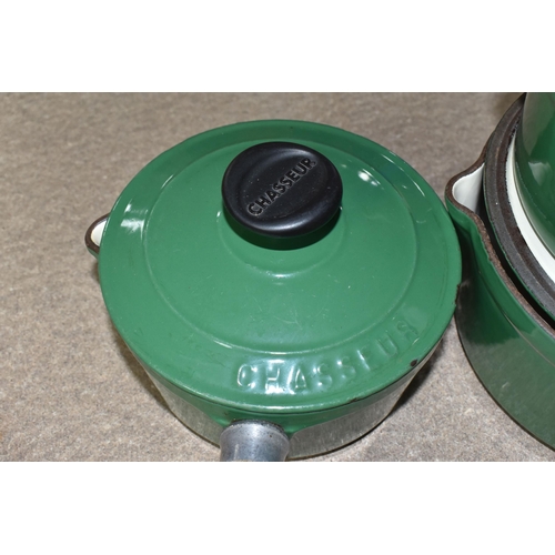 360 - THREE CHASSEUR 'INVICTA' CAST IRON SAUCEPANS, with lids, pouring lips, wooden handles, green enamel ... 