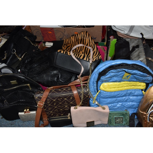 384 - SEVEN BOXES OF LADIES' HANDBAGS, to include large handbags, clutch bags, weekend bags, rucksacks and... 