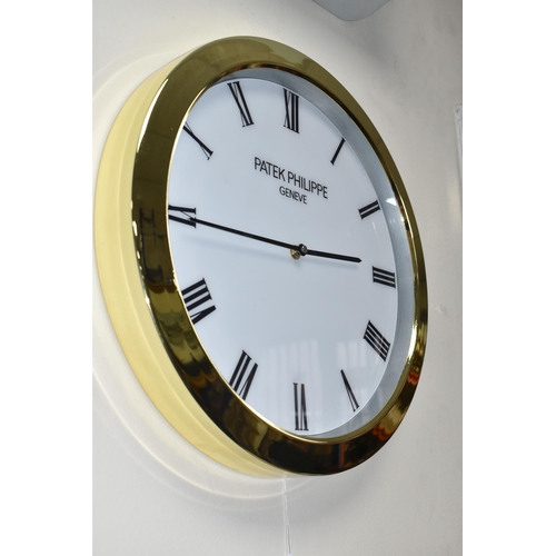 392 - A PATEK PHILIPPE GENEVE DISPLAY CLOCK with printed Roman numeral timestamps on a plain white face an... 