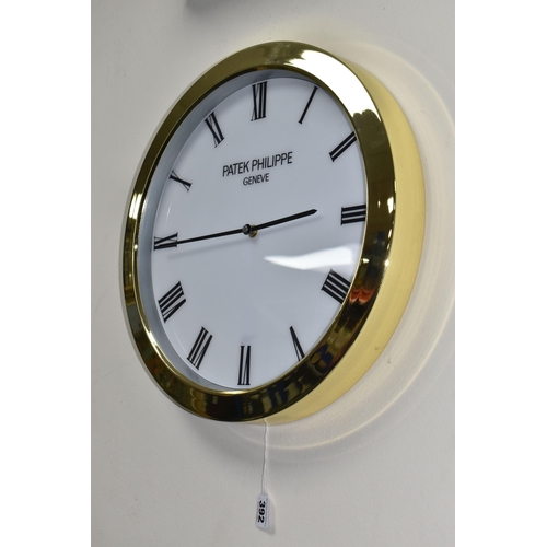 392 - A PATEK PHILIPPE GENEVE DISPLAY CLOCK with printed Roman numeral timestamps on a plain white face an... 