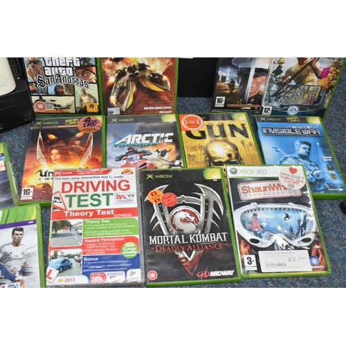 402 - A BOX OF VIDEO GAMES AND CONSOLES, includes a PS2, an original Xbox and an Xbox 360, games include (... 