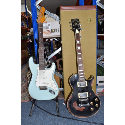 407 - TWO 'VINTAGE' MARKED ELECTRIC GUITARS to include a black bodied electric guitar branded 'Vintage' to... 