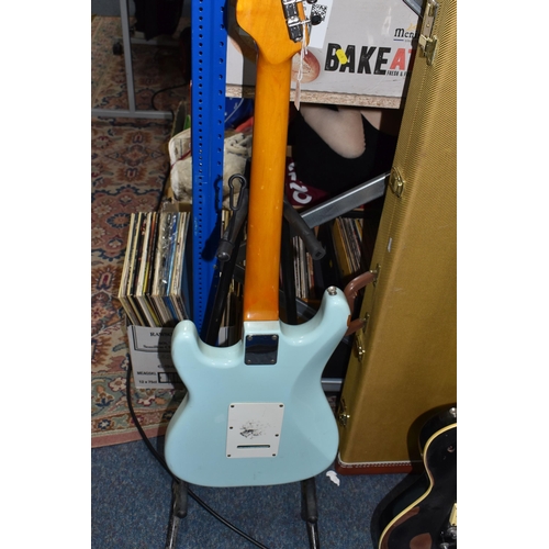 407 - TWO 'VINTAGE' MARKED ELECTRIC GUITARS to include a black bodied electric guitar branded 'Vintage' to... 