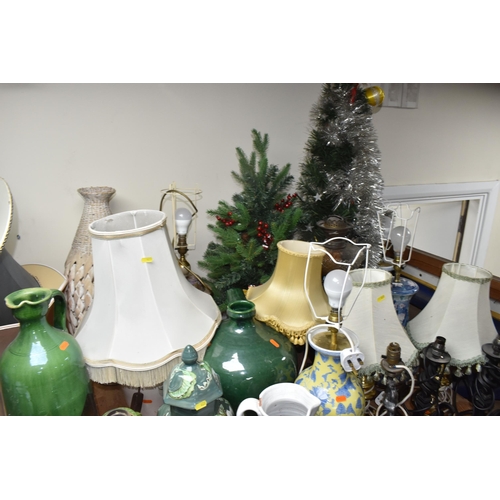 423 - A LARGE QUANTITY OF LAMPS AMD DECORATIVE ORNAMENTS to include approximately fourteen lamps of assort... 