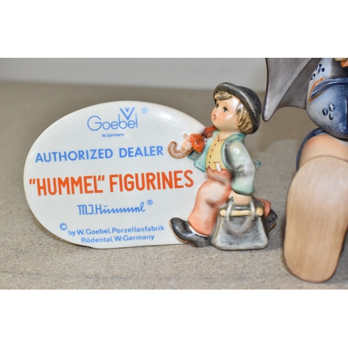 432 - THREE GOEBEL HUMMEL ITEMS to include an 'authorised dealer plaque' No. 187, height 9cm, an ashtray w... 