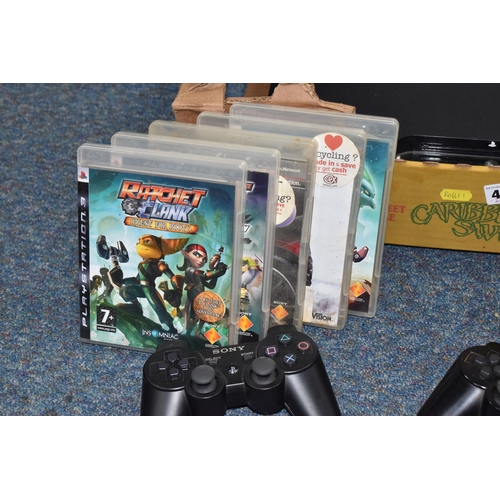 448 - A BOX CONTAINING A PLAYSTATION 3 CONSOLE AND GAMES, includes Ratchet & Clank Tools of Destruction, R... 