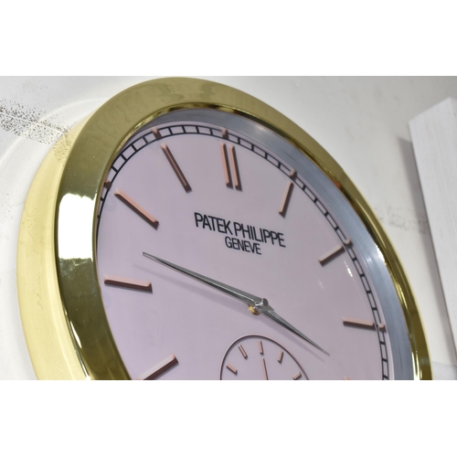 453 - A DISPLAY WALL CLOCK, dial printed 'Patek Philippe, Geneve', with faux subsidiary dial and marked wi... 