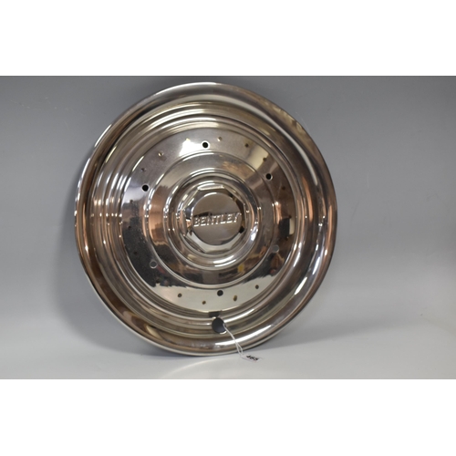 465 - A BENTLEY HUB CAP, diameter 42cm (1) (Condition Report:  appears in good condition, some slight dent... 