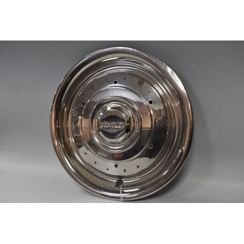 465 - A BENTLEY HUB CAP, diameter 42cm (1) (Condition Report:  appears in good condition, some slight dent... 