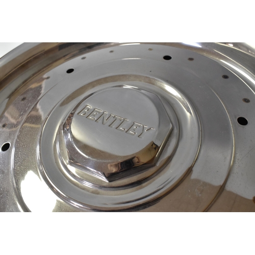 465 - A BENTLEY HUB CAP, diameter 42cm (1) (Condition Report:  appears in good condition, some slight dent... 