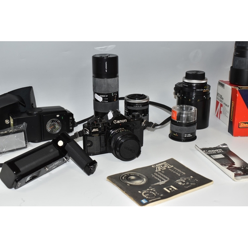 467 - A BOX OF PHOTOGRAPHIC EQUIPMENT, to include a Canon A-1 camera fitted with a Canon f2.8 28mm lens, w... 