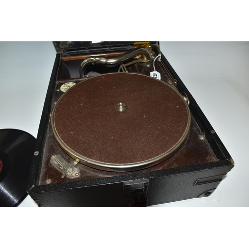 472 - A HMV MODEL 101 PORTABLE WIND-UP GRAMOPHONE, reference number no. 1O1O063796, with 78rpm record stor... 