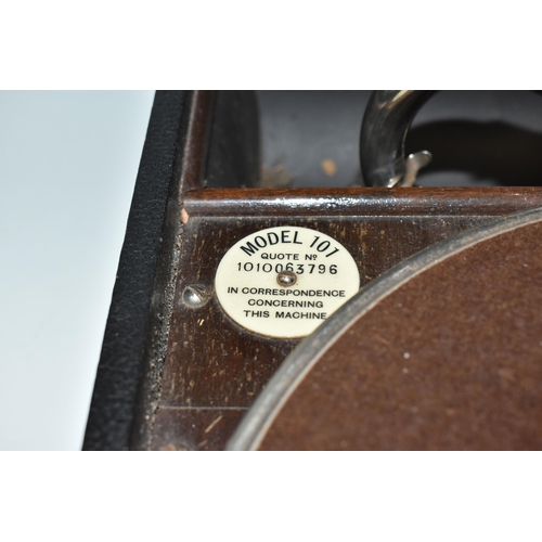 472 - A HMV MODEL 101 PORTABLE WIND-UP GRAMOPHONE, reference number no. 1O1O063796, with 78rpm record stor... 