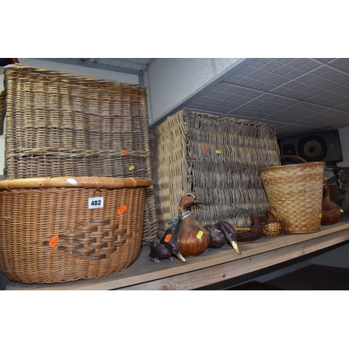 482 - A GROUP OF WICKER BASKETS AND WOODEN ORNAMENTS to include a group of six decorative ducks in assorte... 