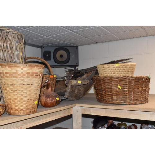 482 - A GROUP OF WICKER BASKETS AND WOODEN ORNAMENTS to include a group of six decorative ducks in assorte... 