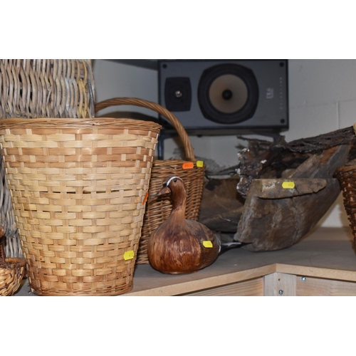 482 - A GROUP OF WICKER BASKETS AND WOODEN ORNAMENTS to include a group of six decorative ducks in assorte... 