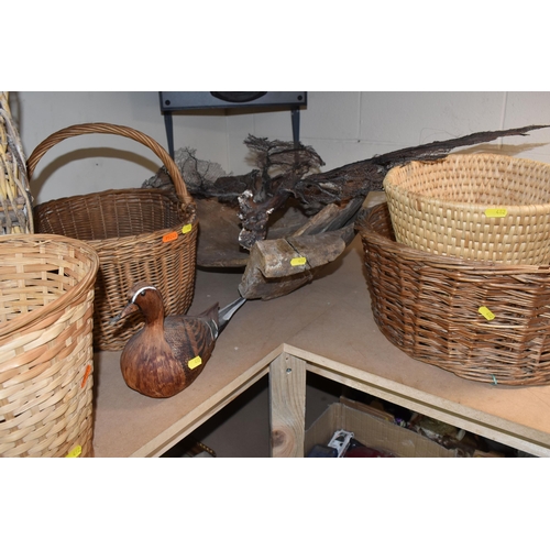 482 - A GROUP OF WICKER BASKETS AND WOODEN ORNAMENTS to include a group of six decorative ducks in assorte... 