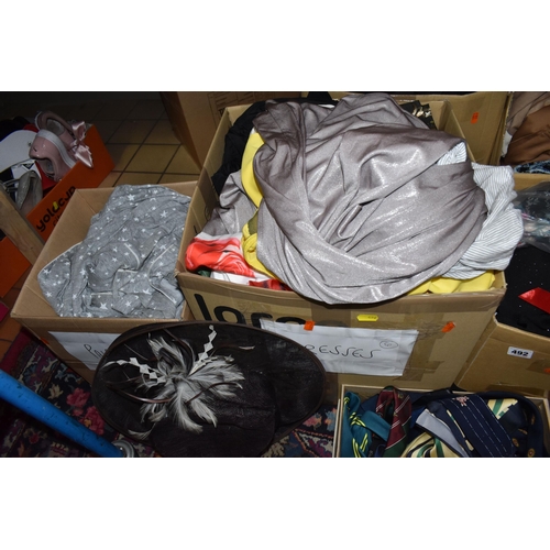 492 - TEN BOXES OF MOSTLY WOMEN'S CLOTHES to include two boxes of dresses from various manufacturers to in... 