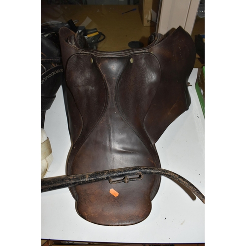 495 - TWO SADDLES AND A PAIR OF HAMES, comprising a western style saddle by Simco, with tooled decoration,... 