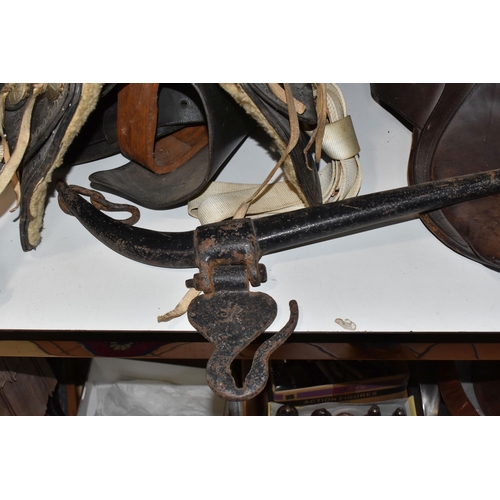 495 - TWO SADDLES AND A PAIR OF HAMES, comprising a western style saddle by Simco, with tooled decoration,... 