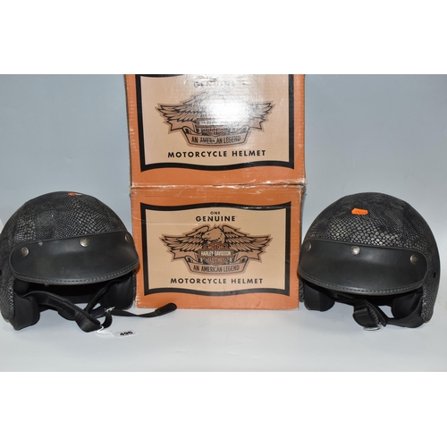 496 - TWO BOXED HARLEY-DAVIDSON MOTORCYCLE HELMETS, with python-effect outer, serial no BS-6658:1985, size... 