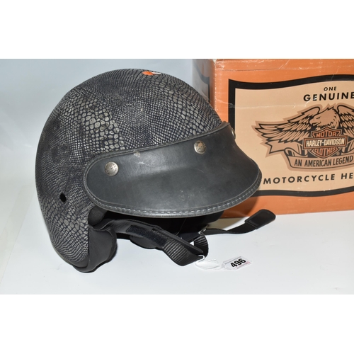 496 - TWO BOXED HARLEY-DAVIDSON MOTORCYCLE HELMETS, with python-effect outer, serial no BS-6658:1985, size... 