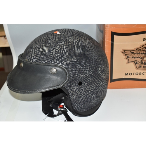 496 - TWO BOXED HARLEY-DAVIDSON MOTORCYCLE HELMETS, with python-effect outer, serial no BS-6658:1985, size... 