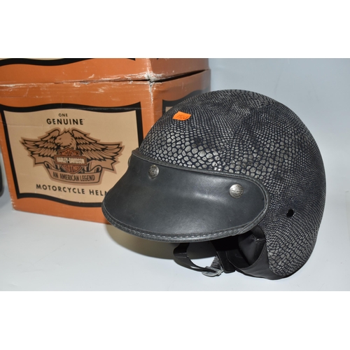 496 - TWO BOXED HARLEY-DAVIDSON MOTORCYCLE HELMETS, with python-effect outer, serial no BS-6658:1985, size... 