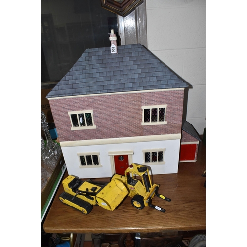 500 - A DOLLS HOUSE AND TWO TONKA VEHICLES, comprising front opening dolls house, four rooms inside, the r... 