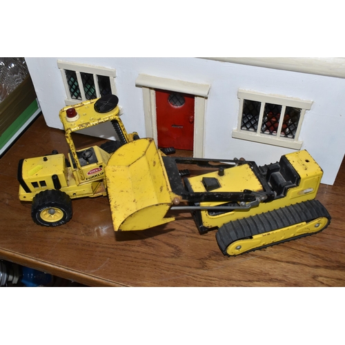 500 - A DOLLS HOUSE AND TWO TONKA VEHICLES, comprising front opening dolls house, four rooms inside, the r... 