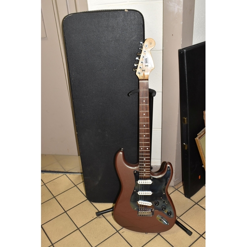 505 - A COPY OF A FENDER STRATOCASTER GUITAR, metallic painted finish to the body with distressed metal pi... 