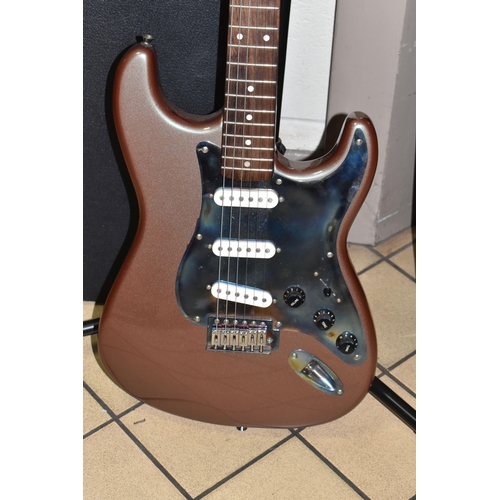 505 - A COPY OF A FENDER STRATOCASTER GUITAR, metallic painted finish to the body with distressed metal pi... 