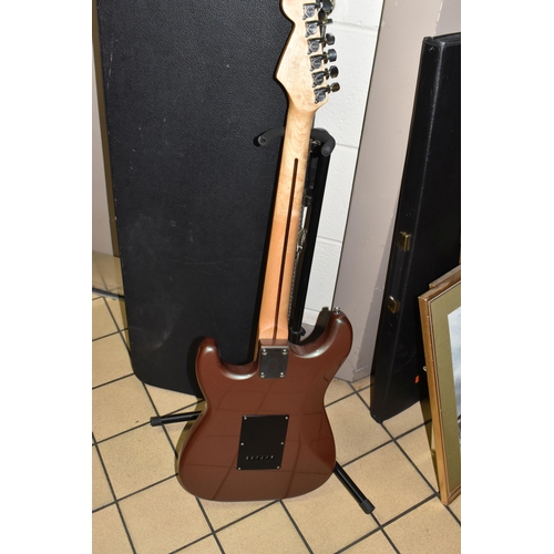 505 - A COPY OF A FENDER STRATOCASTER GUITAR, metallic painted finish to the body with distressed metal pi... 