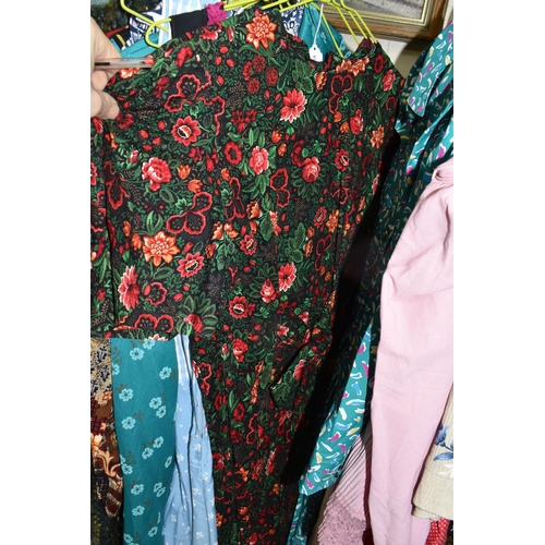 517 - A QUANTITY OF MODERN AND VINTAGE LADIES' CLOTHING, to include coats, dresses and blouses, brands  An... 