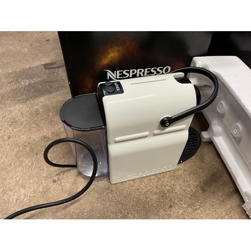 1059 - A NESPRESSO COFFEE MACHINE in white with original box (both PAT pass and working) and a new in box R... 