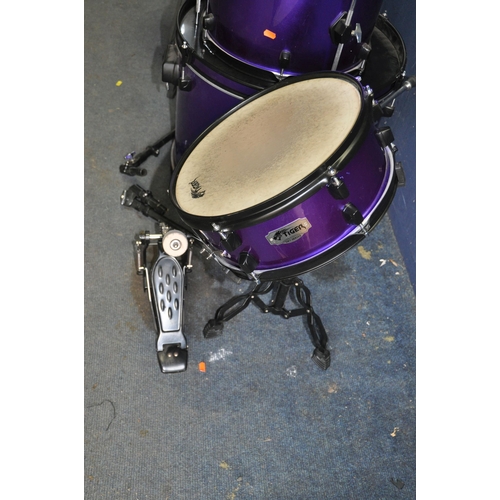 1061 - A TIGER DKT SERIES FIVE PIECE DRUM KIT IN METALLIC PURPLE with 12in and 13in rack toms with arms, 16... 