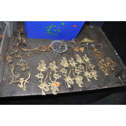 1066 - FOUR TRAYS CONTAINING FURNITURE ADORNMENTS, including early 20th century and earlier Ormolu and Roco... 